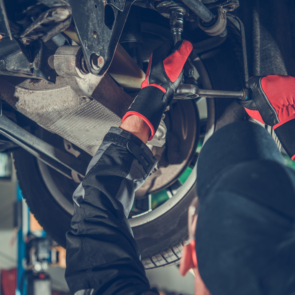 mechanic working on car