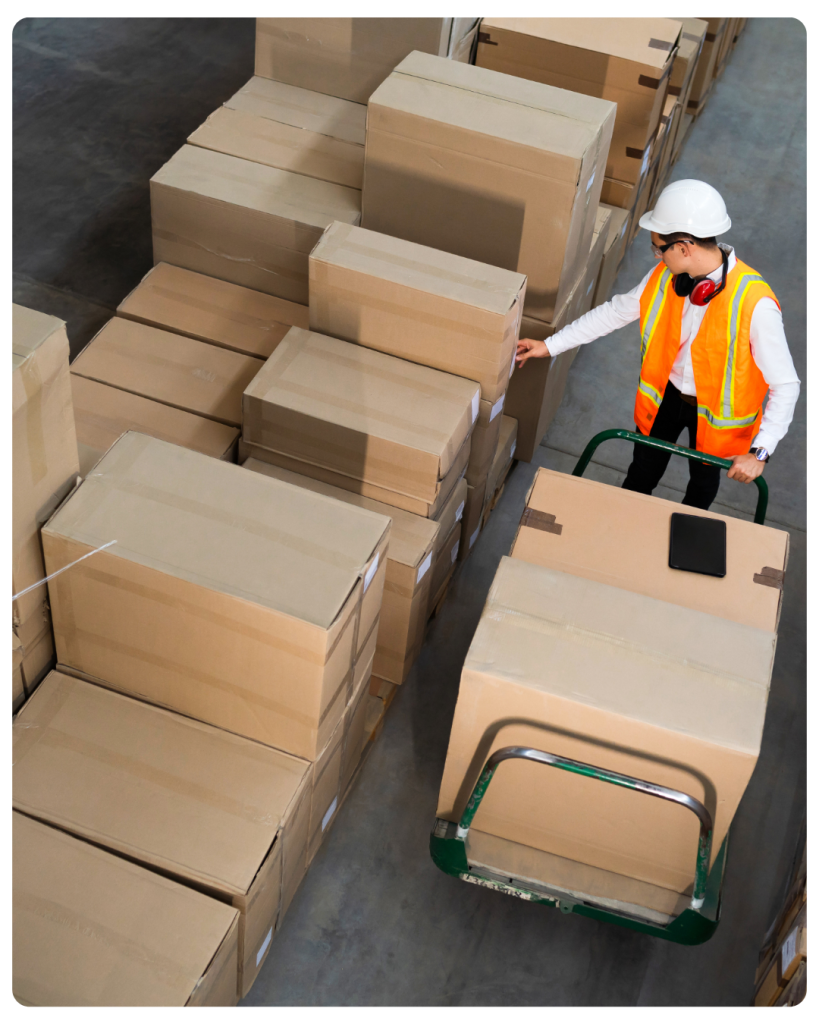 warehouse person grabbing packages